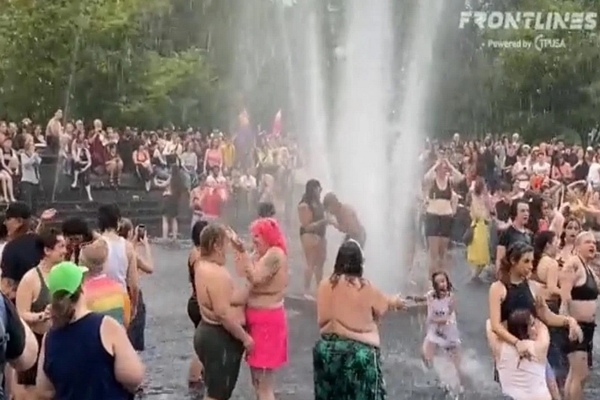 SICKENING: Topless “Women” Dance and Play with Children at Pride Event Water Party in New York City (VIDEO)